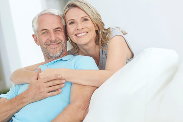 Mature couple looking relaxed and energized, illustrating bioidentical hormone therapy outcomes